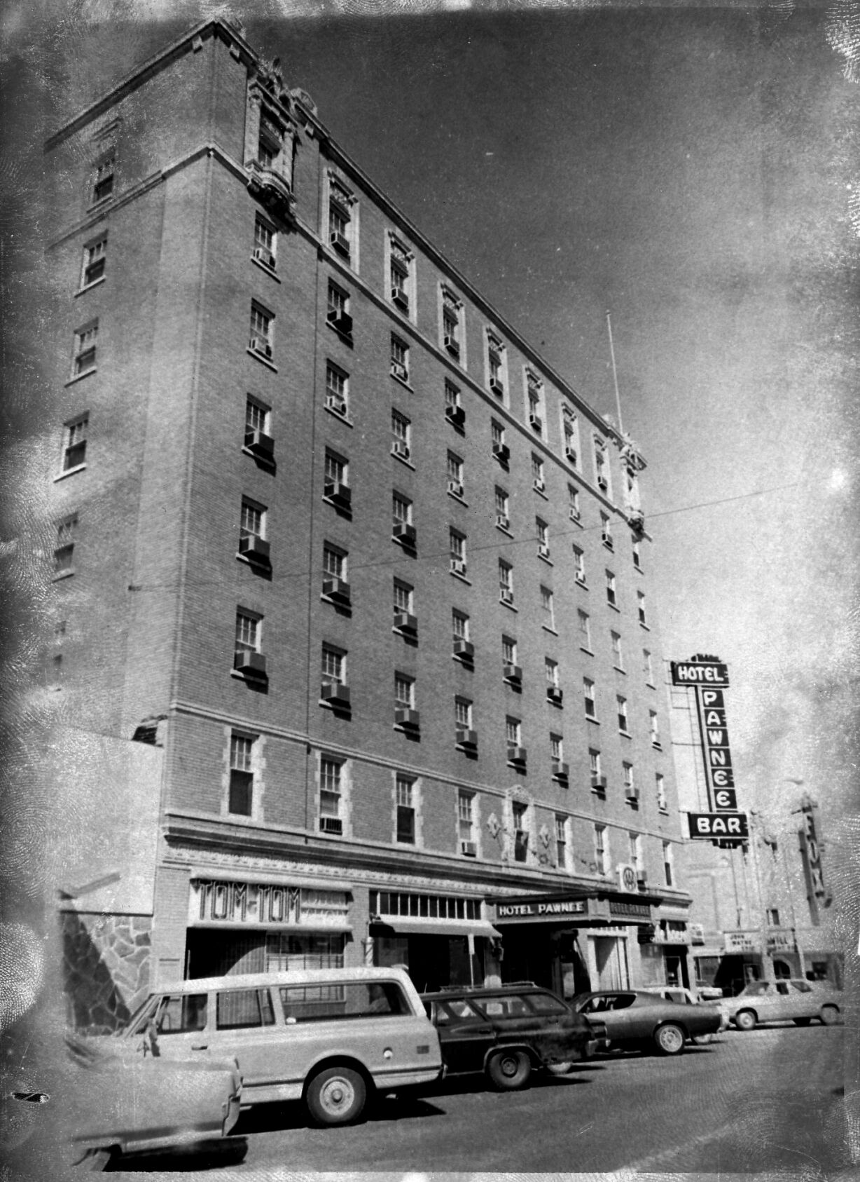 Hotel Pawnee's Tom-Tom Coffee Shop sign uncovered